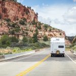 RV On A Trip Through Mountains