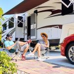 Millenial Couple Outside an RV