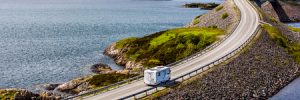 RV driving on road in mountains