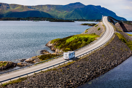 RV driving on road in mountains