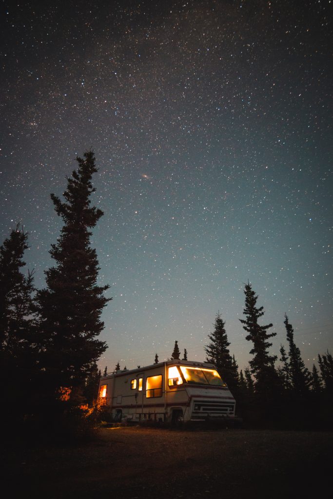RV road trip under the night sky